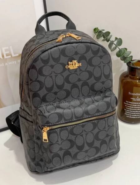 Mochila COACH  Glamour y Variedades